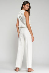 WHITE PUNTO CREPE FLARED-LEG TROUSERS