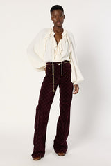 ANNA BURGUNDY MONOGRAM FLARED VELVET TROUSERS