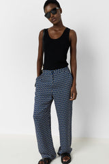 ANDRA FLOWING GRAPHIC PRINT TROUSERS