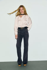 ANNA MONOGRAM FLARED JEANS