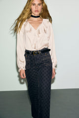 ANNA MONOGRAM FLARED JEANS