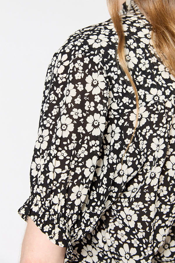 URENE RUFFLED TWO TONE BLACK FLORAL BLOUSE