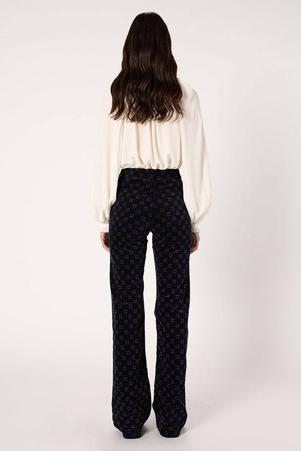 ANNA NAVY MONOGRAM FLARED VELVET TROUSERS