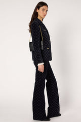 ANNA NAVY MONOGRAM FLARED VELVET TROUSERS