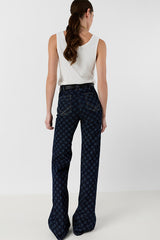 ANNA MONOGRAMMED FLARED JEANS