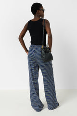ANDRA FLOWING GRAPHIC PRINT TROUSERS