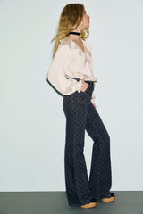 ANNA MONOGRAM FLARED JEANS
