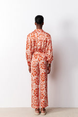 MORGANA CORAL PRINTED SATIN EFFECT FLARED TROUSERS