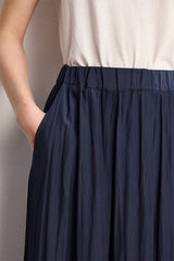 NAIA NAVY PLEATED SATIN MIDI SKIRT