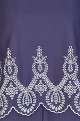 SLEEVELESS EMBROIDERED HEM TOP