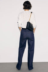 IVY FLARED RAW-DENIM JEANS