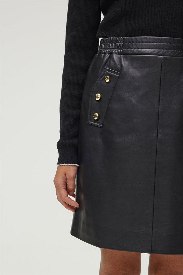 YSSAMBRE SHORT LEATHER SKIRT