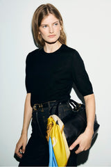 REINE BLACK FINE WOOL SHORT-SLEEVED SWEATER