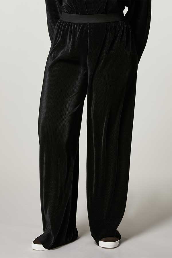 OIL PLEATED JERSEY TROUSERS