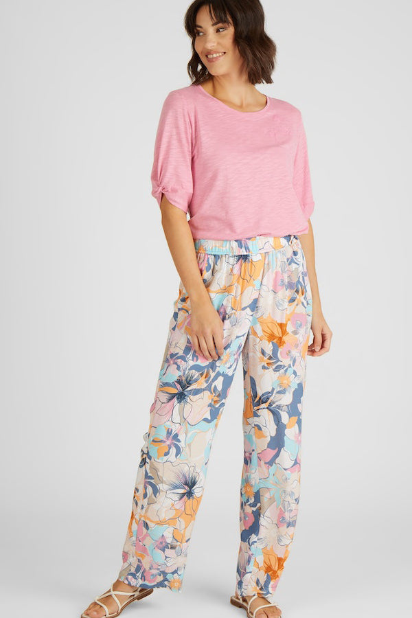 ORANGE FLORAL PRINT TROUSERS